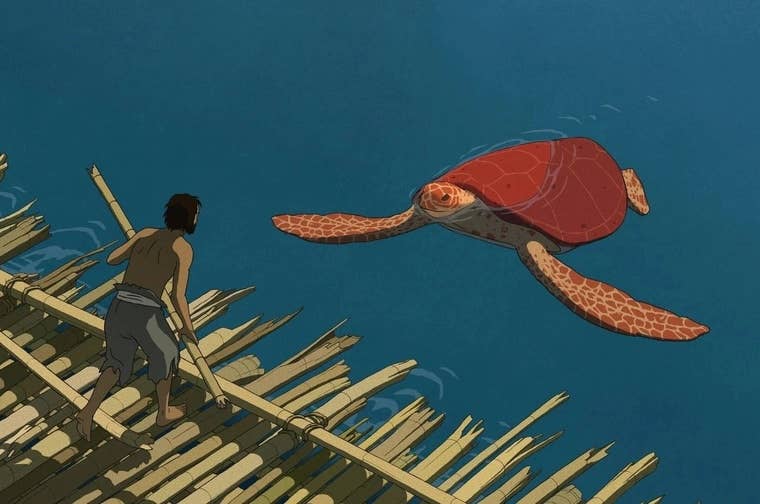 A man stands on a wooden raft as a large red turtle swims towards him in blue water.